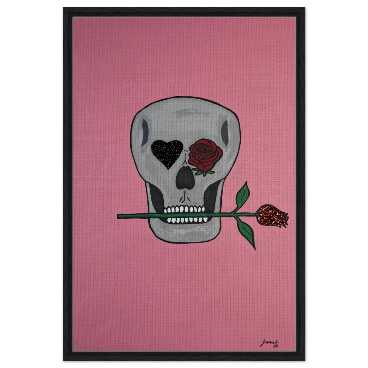 Framed 24×36 Johnny X canvas showing a gray skull on pink field, one eye a black heart, the other a red rose, a rose between its teeth.