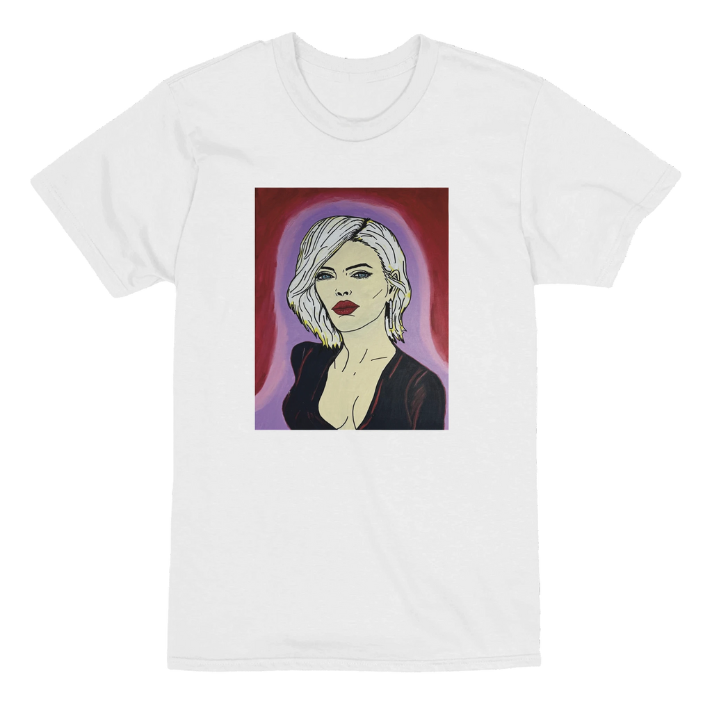 Heavyweight unisex tee printed with Johnny X's The Alchemist — portrait of a woman with platinum hair, piercing blue eyes and deep red lips