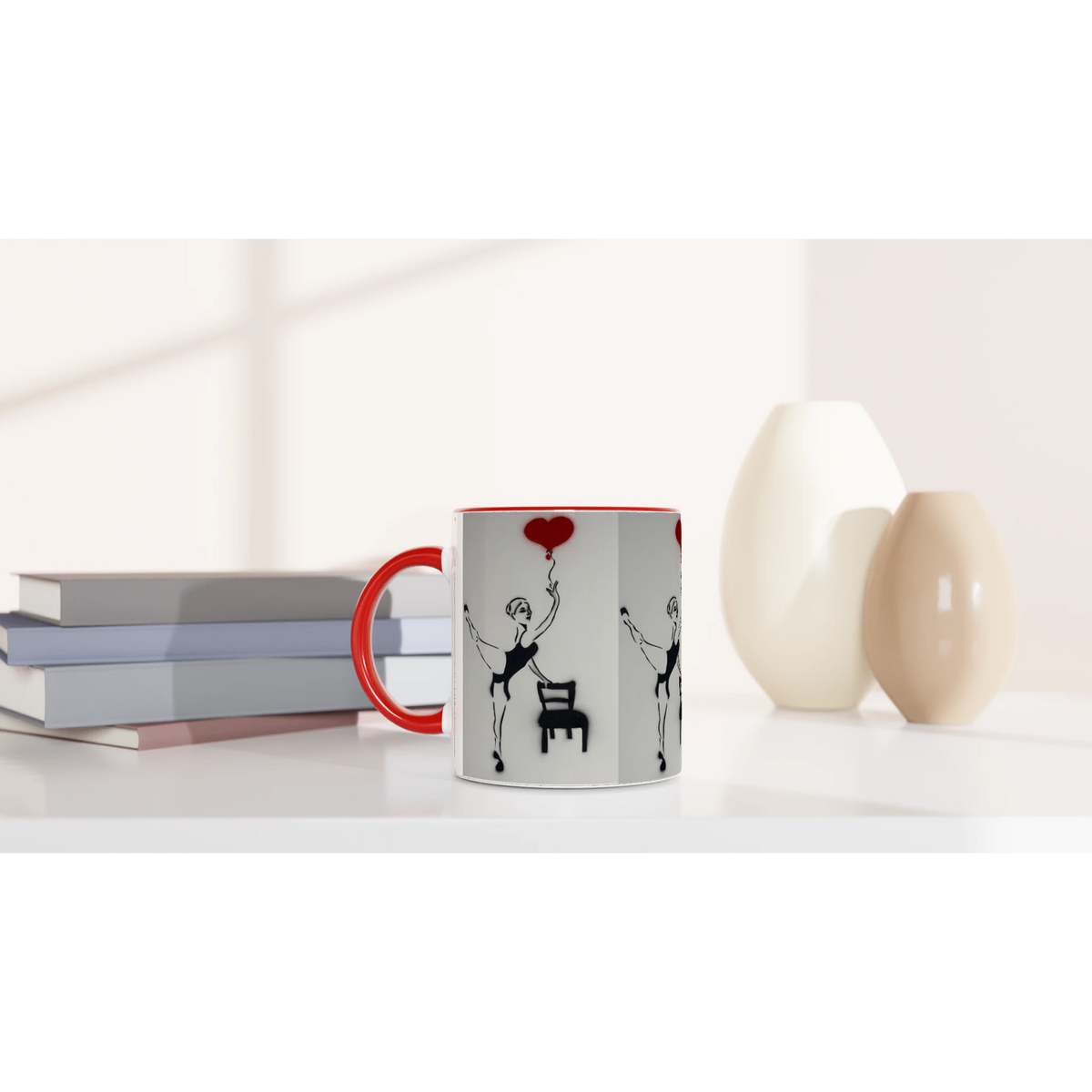 Glossy ceramic art mug showing Johnny X’s Balloon of Love: a daughter reaching for a red heart balloon beside an empty chair