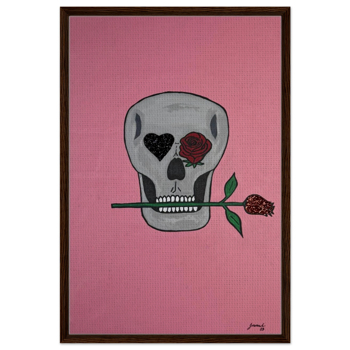 Framed 24×36 Johnny X canvas showing a gray skull on pink field, one eye a black heart, the other a red rose, a rose between its teeth.