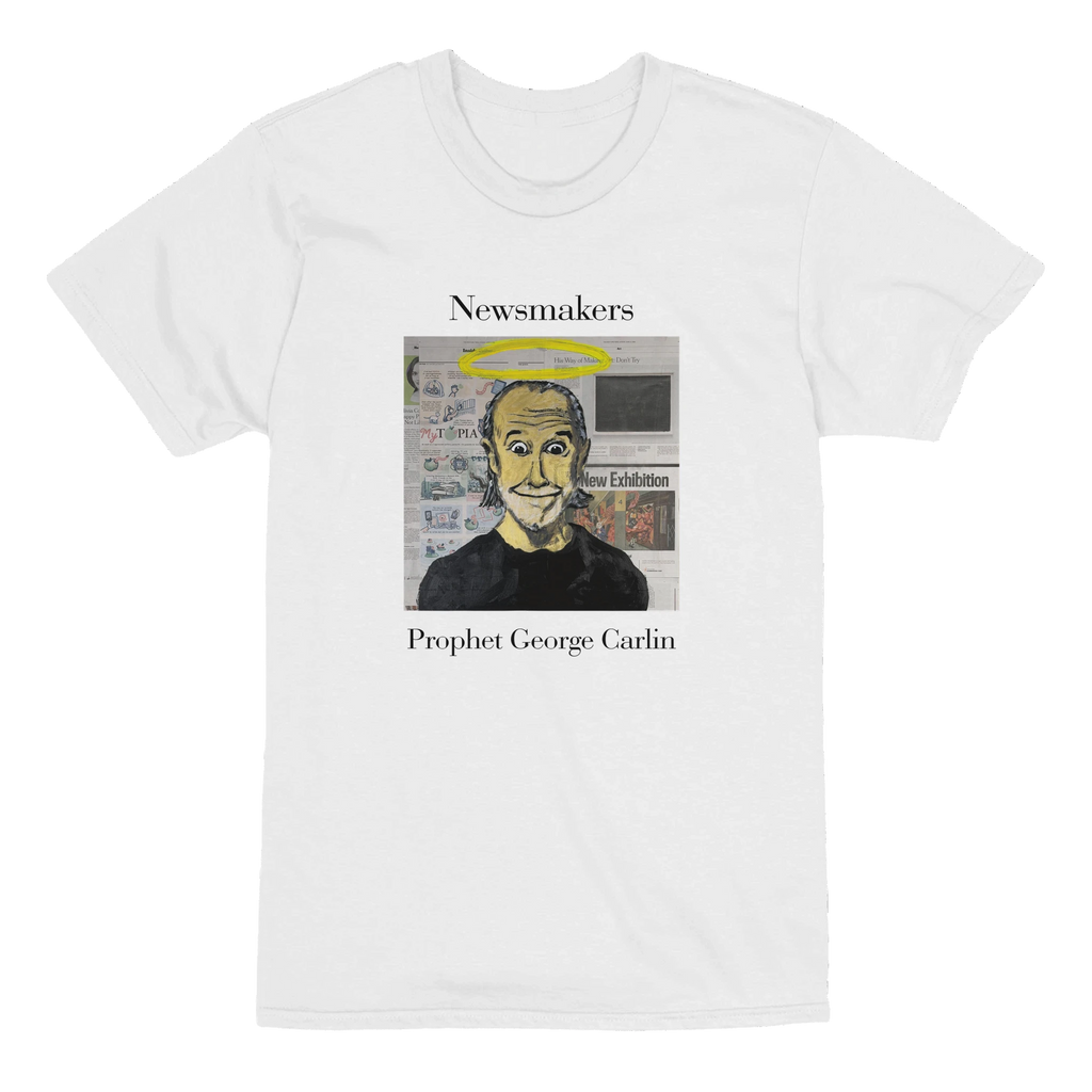 Heavyweight unisex tee featuring Johnny X’s Newsmakers portrait 'Prophet George Carlin' with a halo above the comedian