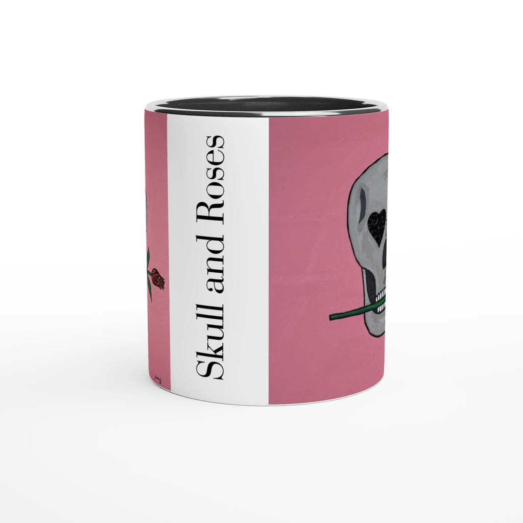 11 oz glossy ceramic mug showing Johnny X's Skull and Roses: gray skull on pink background with roses and a glittering heart eye