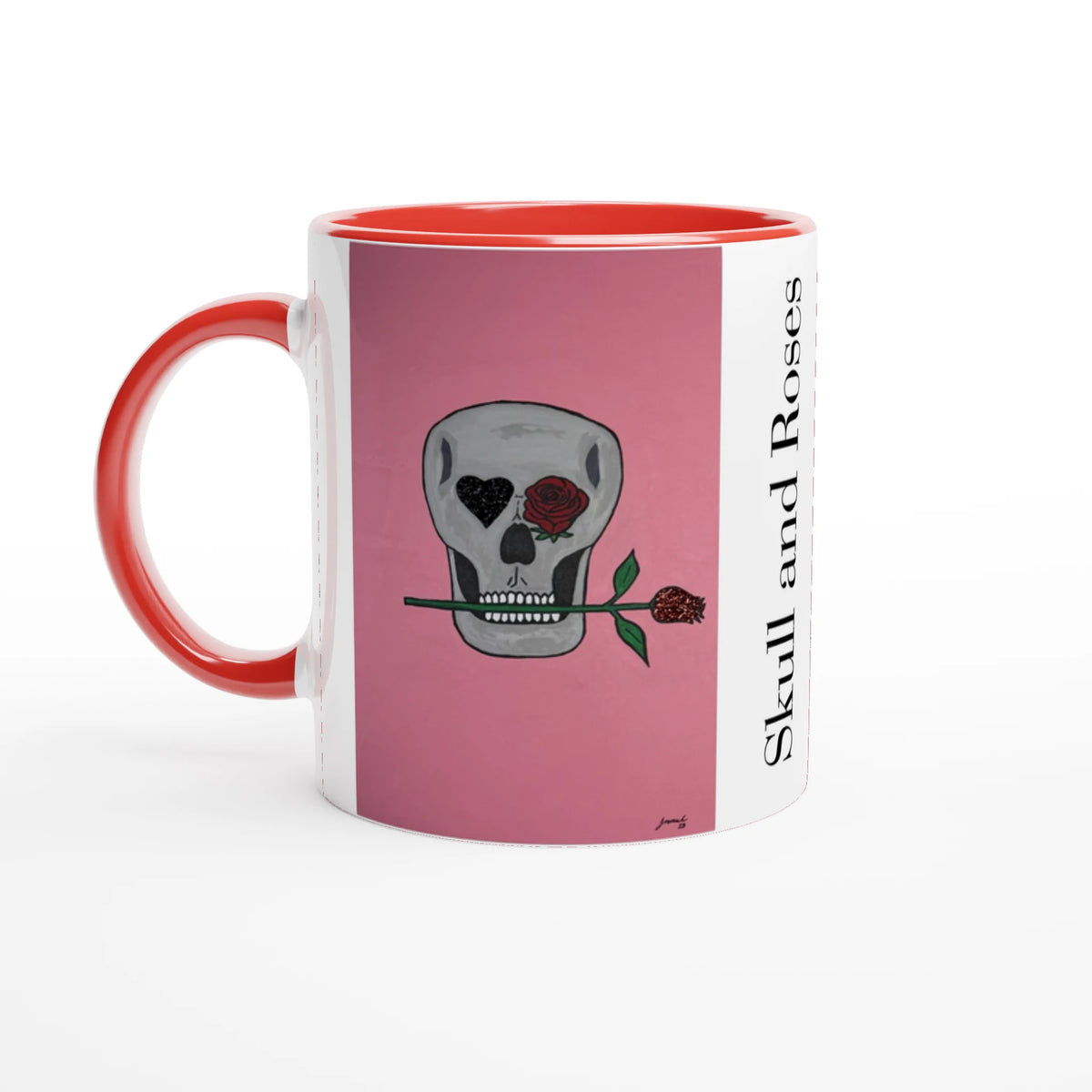 11 oz glossy ceramic mug showing Johnny X's Skull and Roses: gray skull on pink background with roses and a glittering heart eye