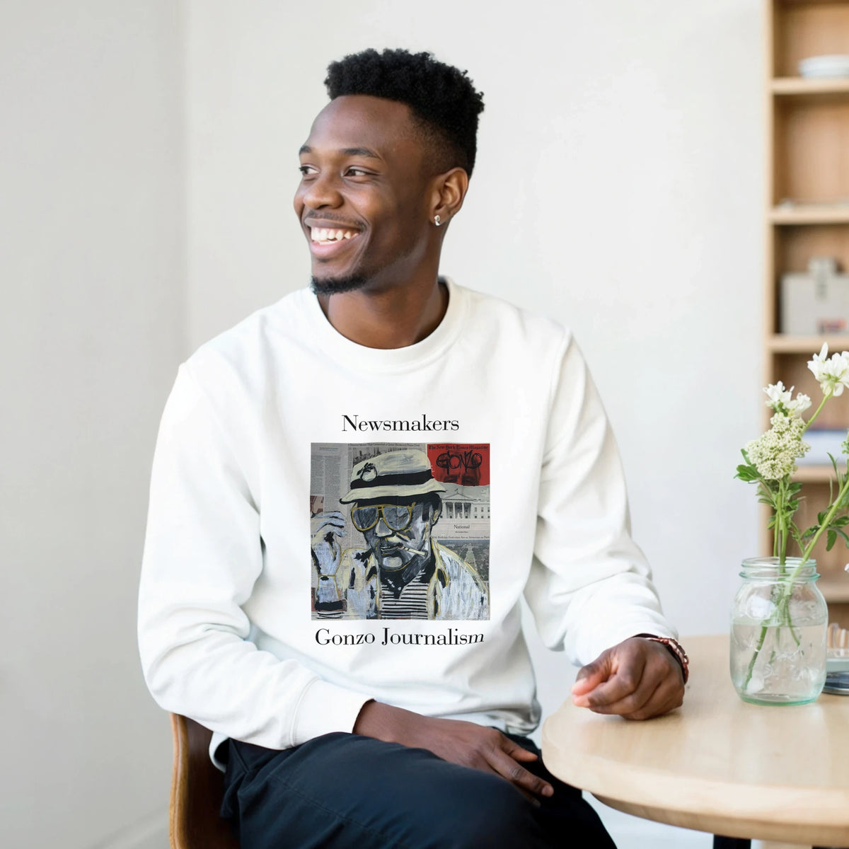 Classic heavy-blend crewneck sweatshirt printed with Johnny X’s Newsmakers — Gonzo Journalism portrait over newspaper pages in black, white and gold.