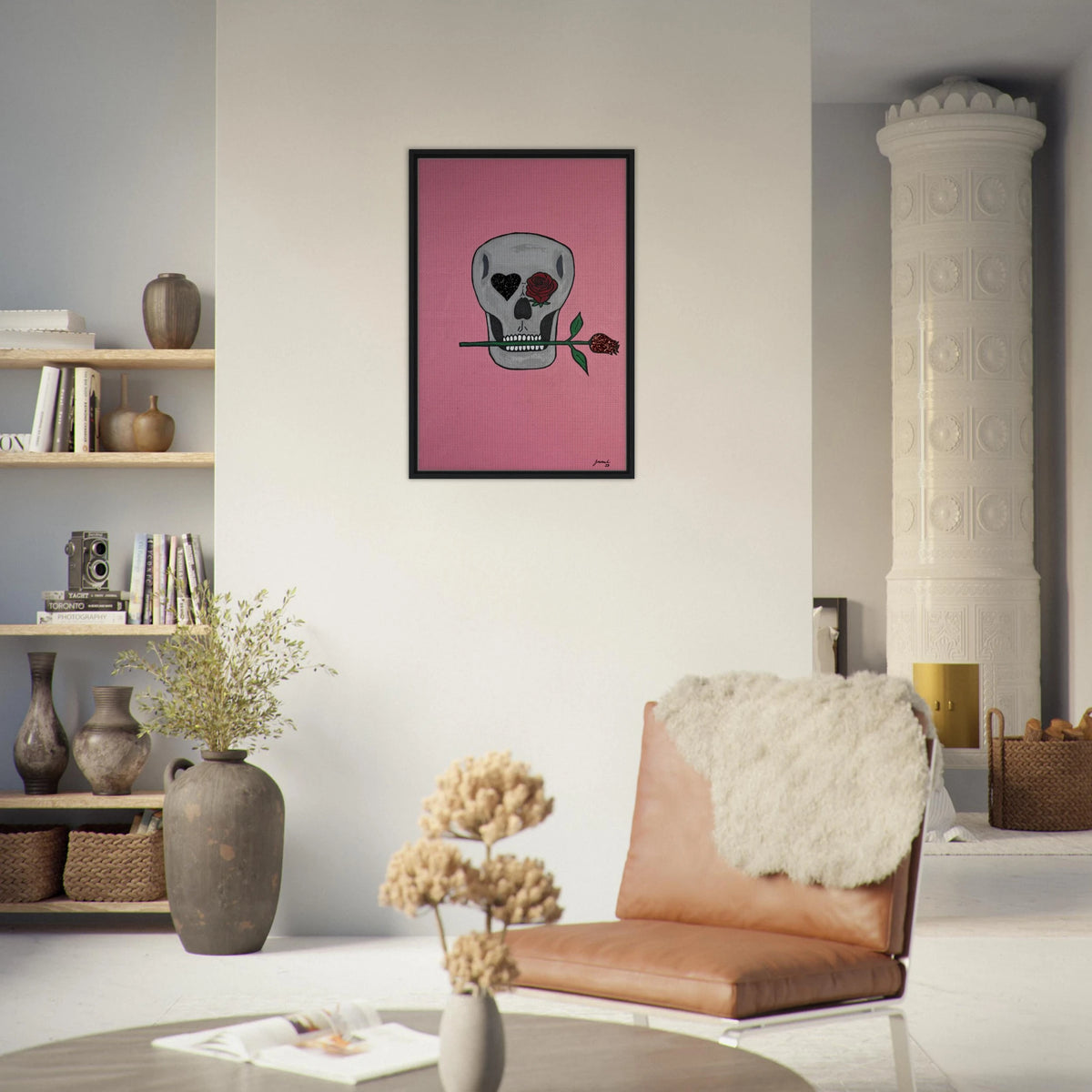 Framed 24×36 Johnny X canvas showing a gray skull on pink field, one eye a black heart, the other a red rose, a rose between its teeth.