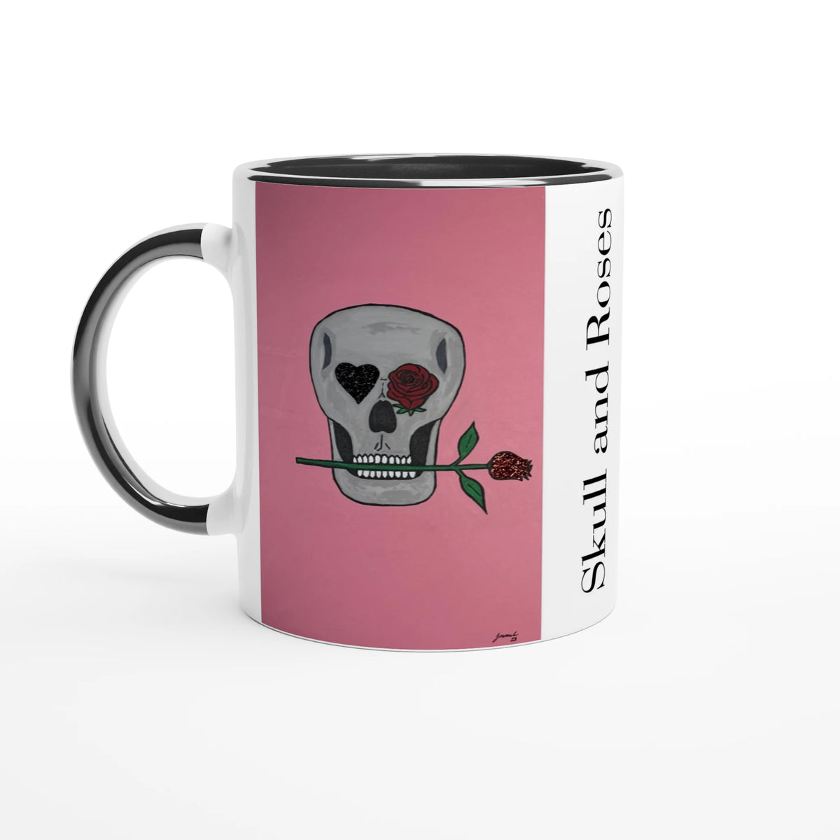11 oz glossy ceramic mug showing Johnny X's Skull and Roses: gray skull on pink background with roses and a glittering heart eye